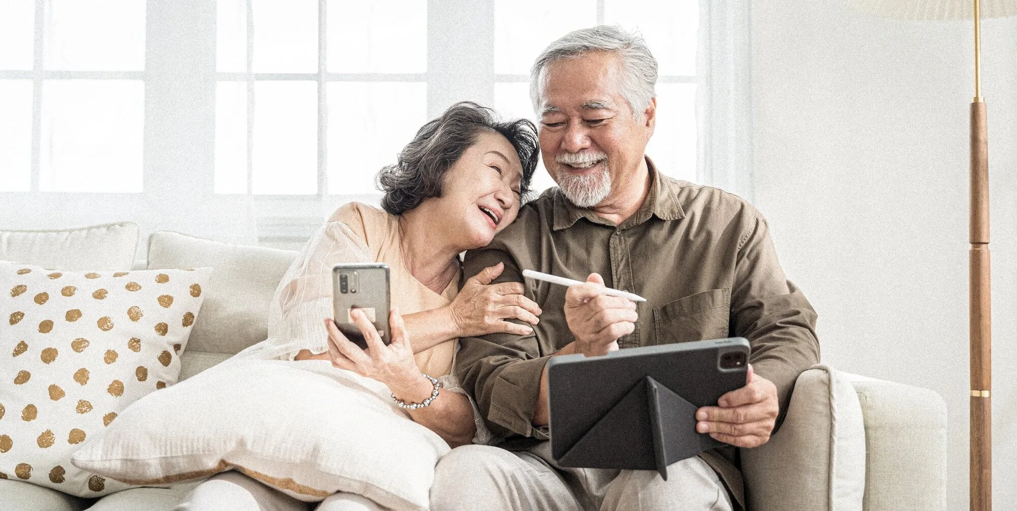 A old couple sitting and smiling together - Denteast